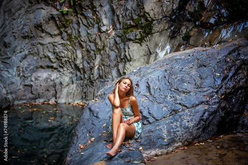 beautiful girl posing in dress at the waterfall © emaria