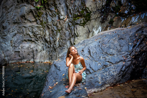 beautiful girl posing in dress at the waterfall © emaria