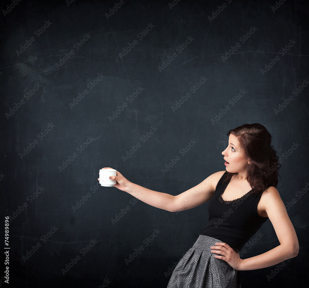 Businesswoman holding a white cup