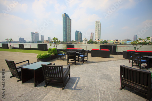 restaurant seats and tables near the river, restaurant interior