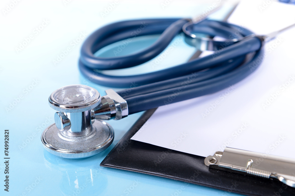 Stethoscope on light blue background Stethoscope on light blue background