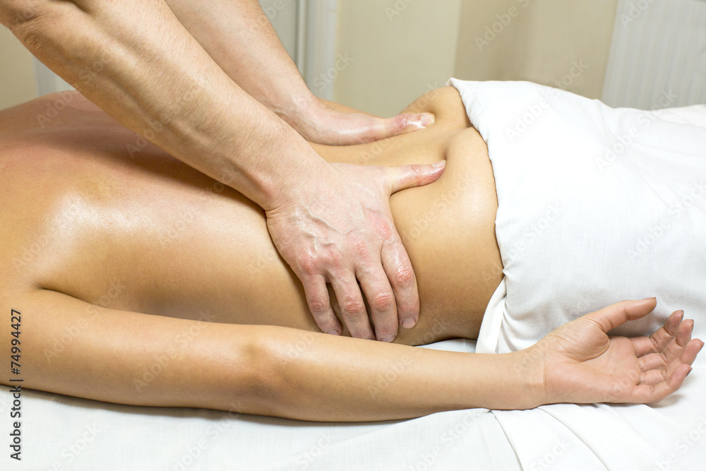 Woman in a beauty salon doing massage Woman in a beauty salon doing massage