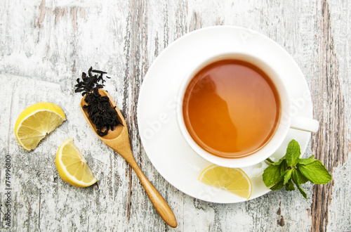 Cup of tea with lemon and mint #74996800