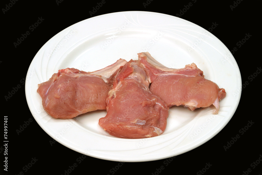 Meat on a white plate Meat on a white plate