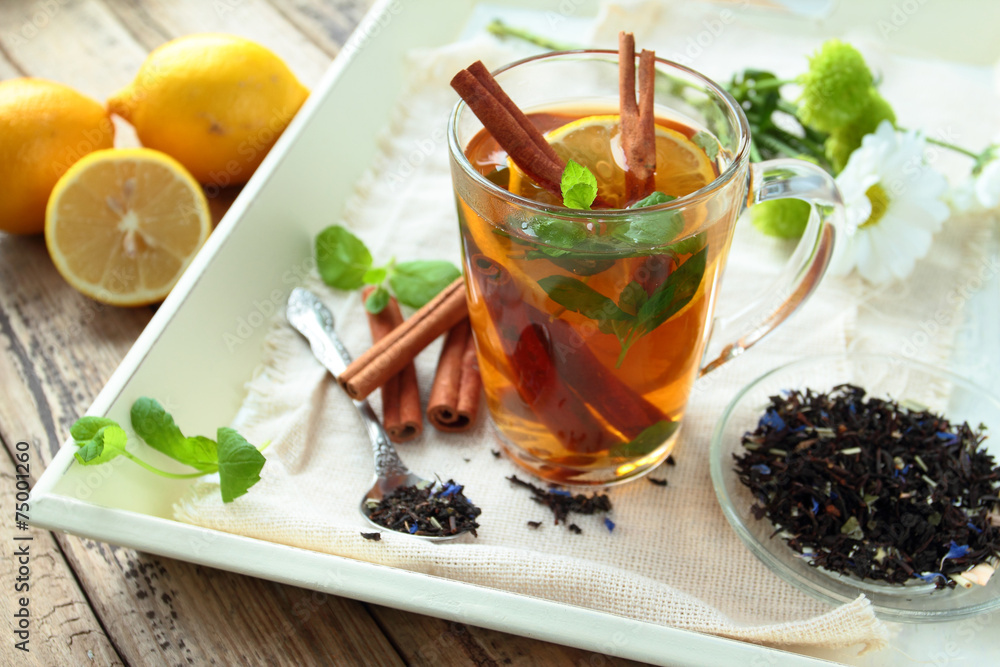 Hot leaf tea with cinnamon lemon and mint leafs Hot leaf tea with cinnamon lemon and mint leafs
