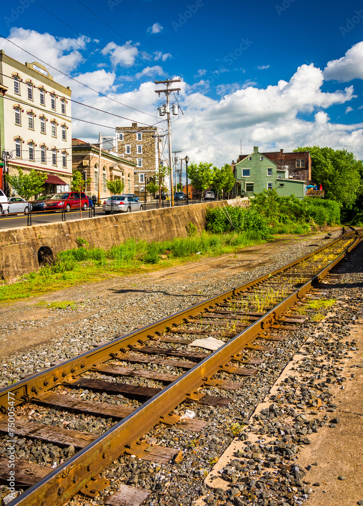 Railroad tracks and buildings on Main Street in Phillipsburg, Ne