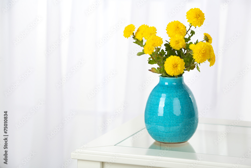 Beautiful bouquet of flowers in vase on window background Beautiful bouquet of flowers in vase on window background