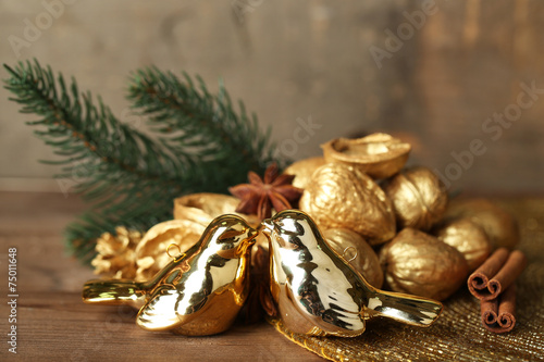Beautiful Christmas composition with golden walnuts,
