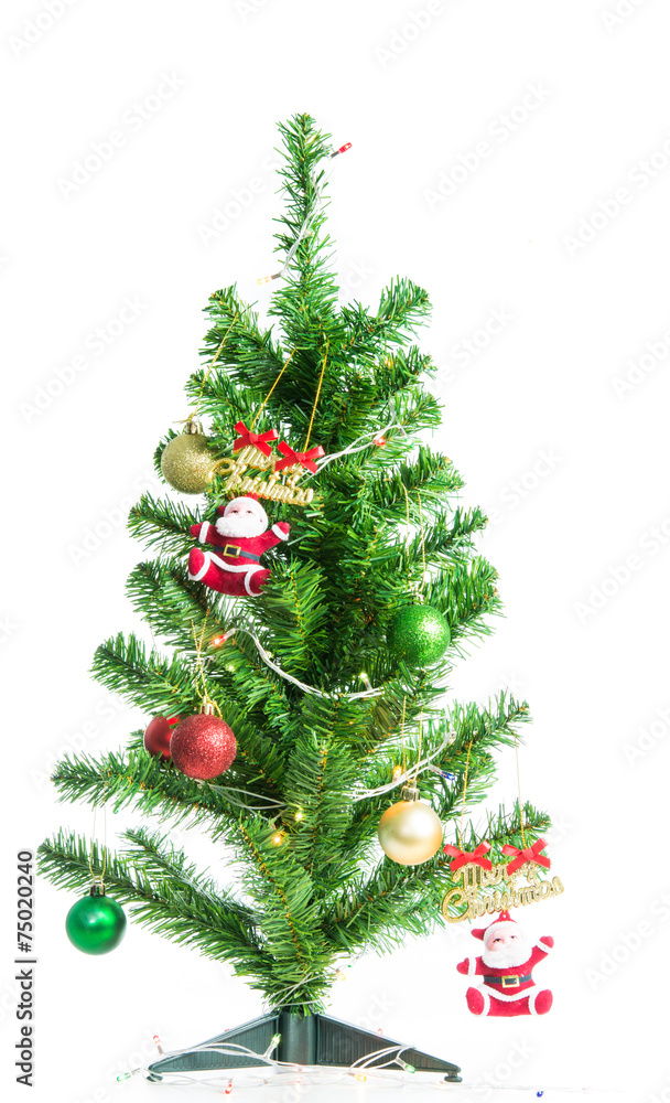 Fototapeta premium Santa hang at the Christmas tree