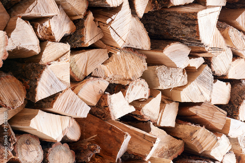 Woodpile from dry oak logs.