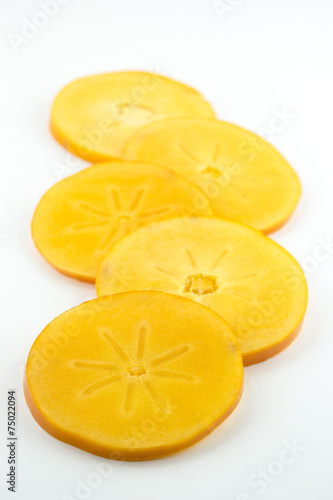 orange persimmon slices