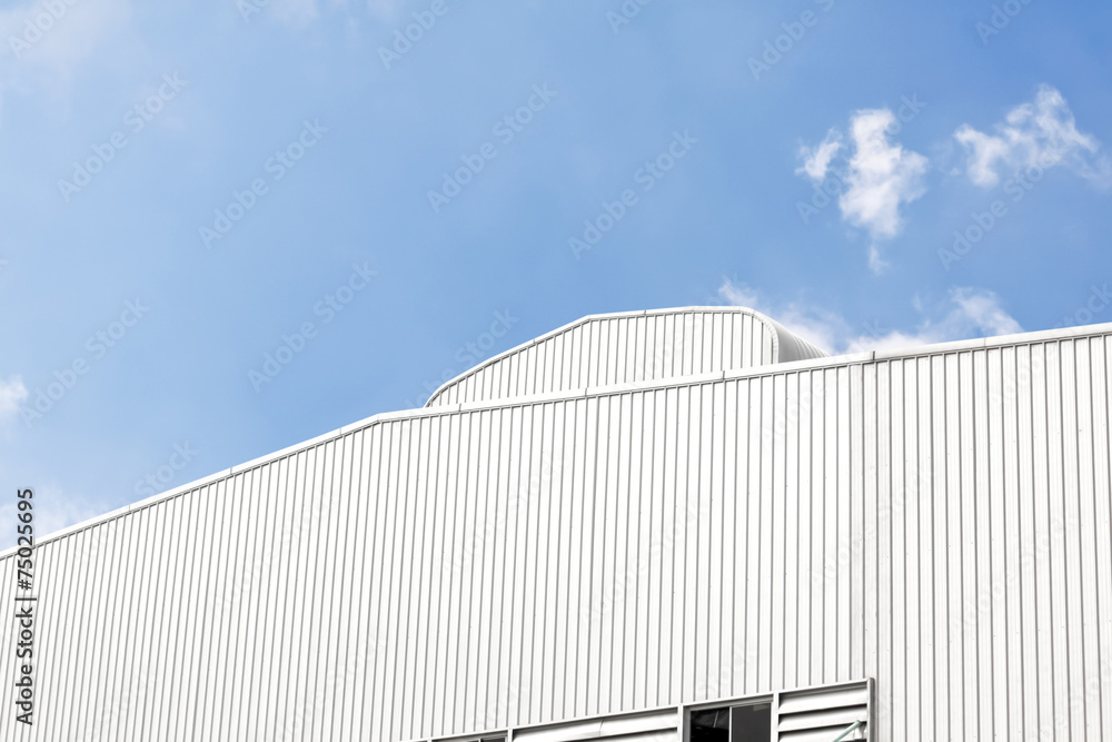 factory roof with blue sky background.