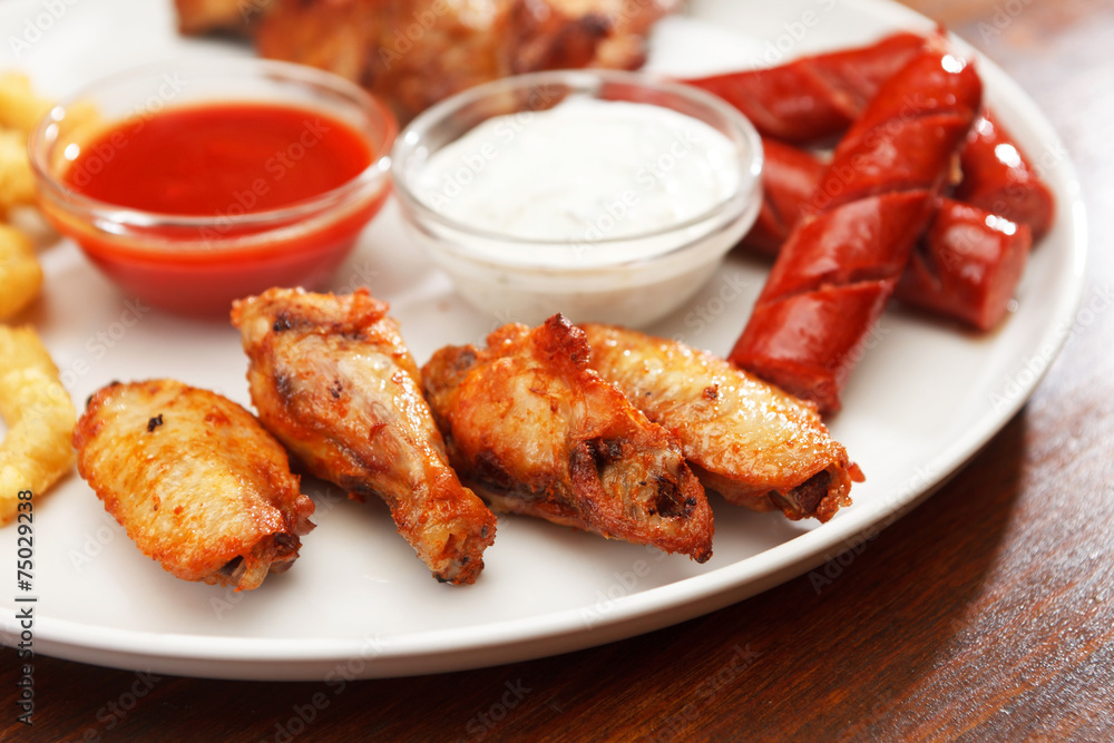 Appetizer plate with dipping sauces Appetizer plate with dipping sauces
