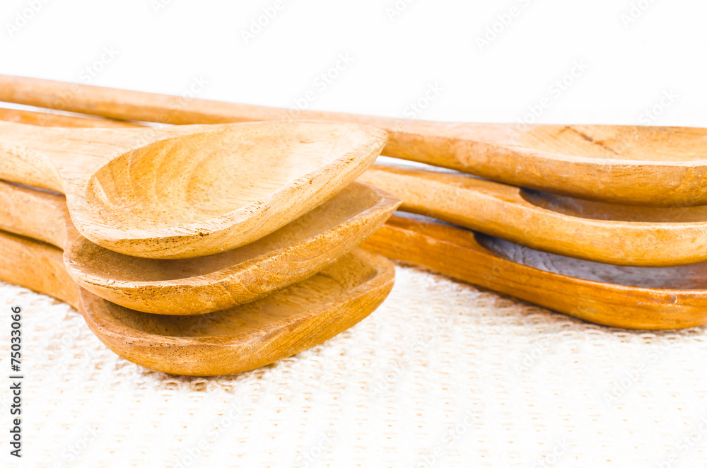 set of wooden spoon on cloth background,ladle set of wooden spoon on cloth background,ladle