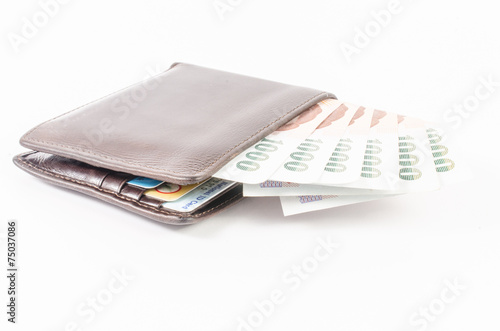 thai banknote in wallet on white background