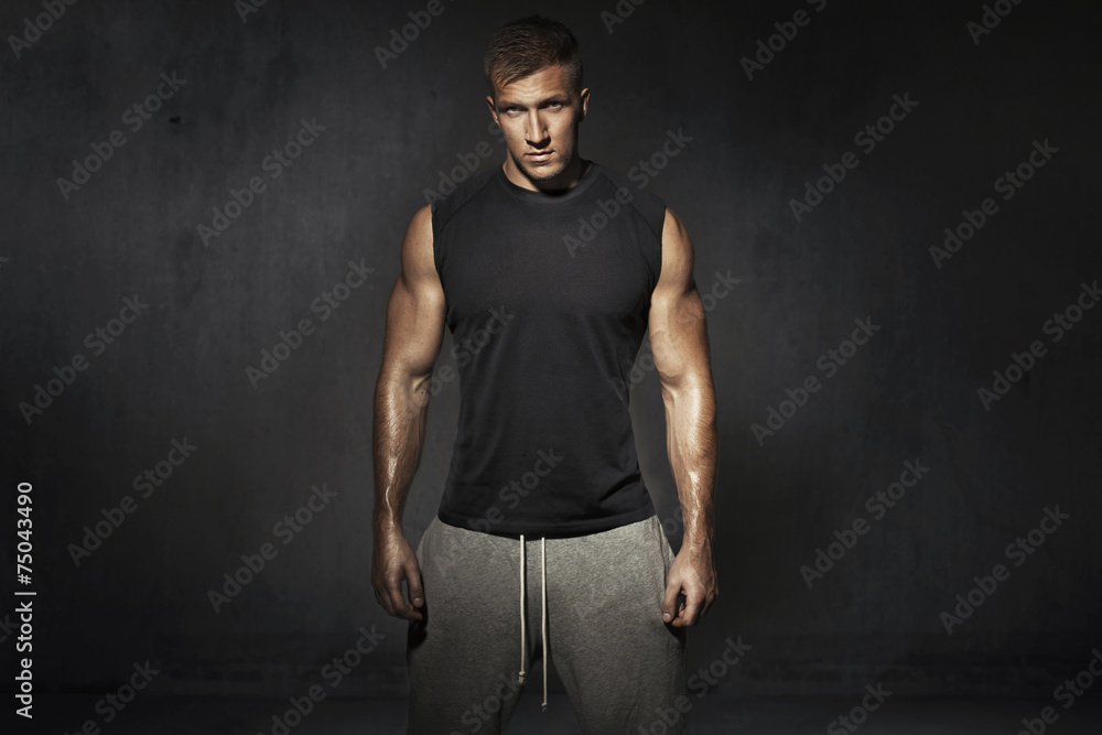 Tall, muscular man during the training Tall, muscular man during the training