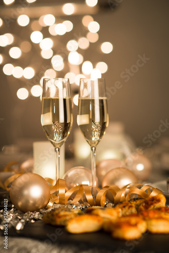 new years eve party table with two champagne flute