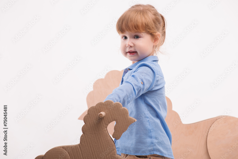 Child with the toy horse Child with the toy horse
