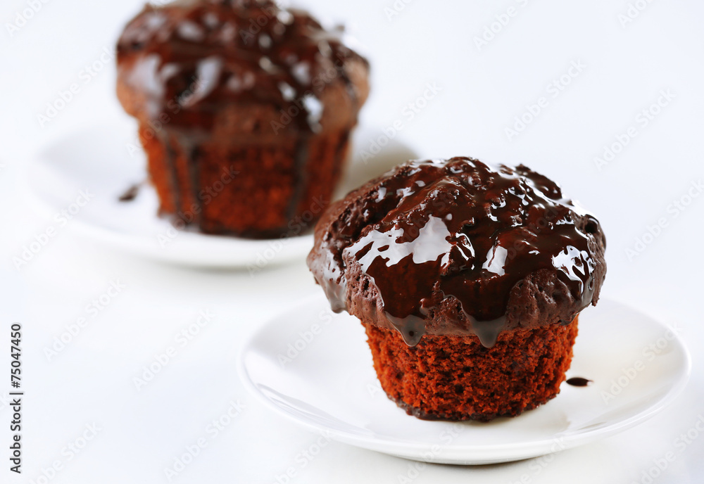 Yummy chocolate cupcakes on table Yummy chocolate cupcakes on table