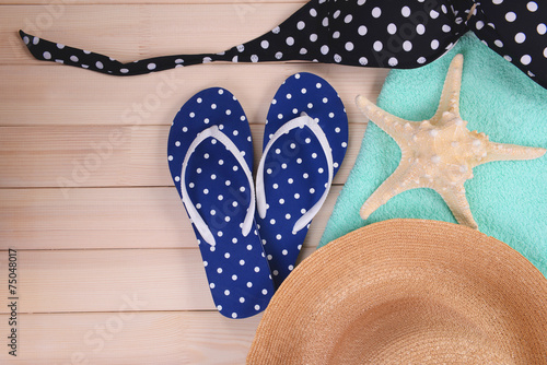 Summer items on wooden background