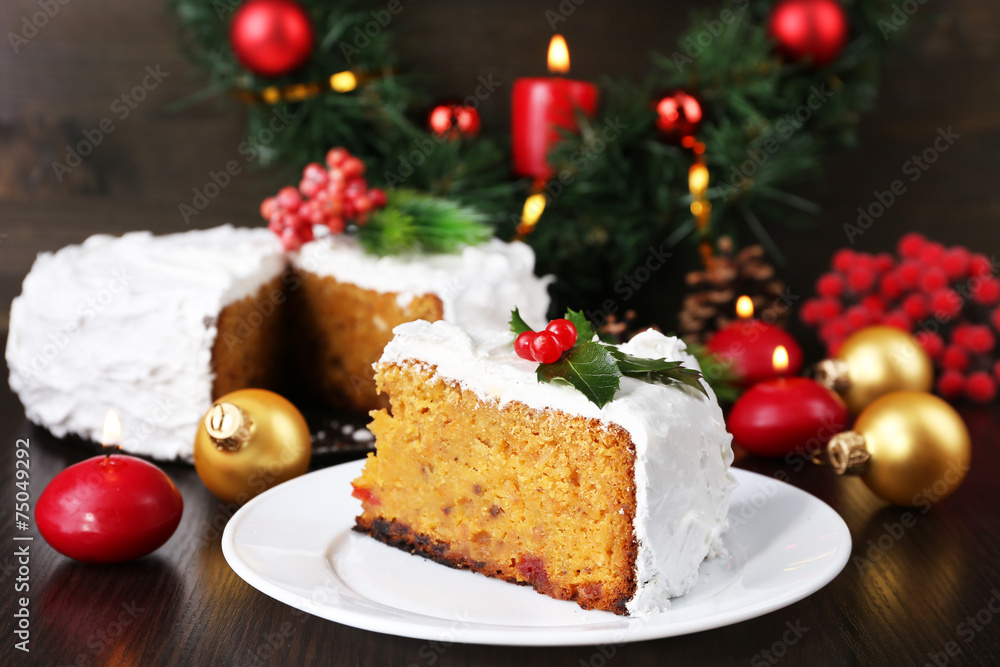 Slice of cake covered cream with Christmas decoration Slice of cake covered cream with Christmas decoration