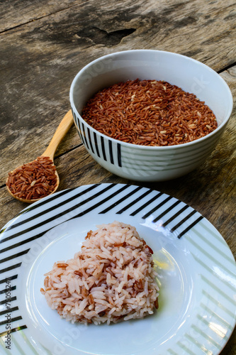 Brown rice on wooden table