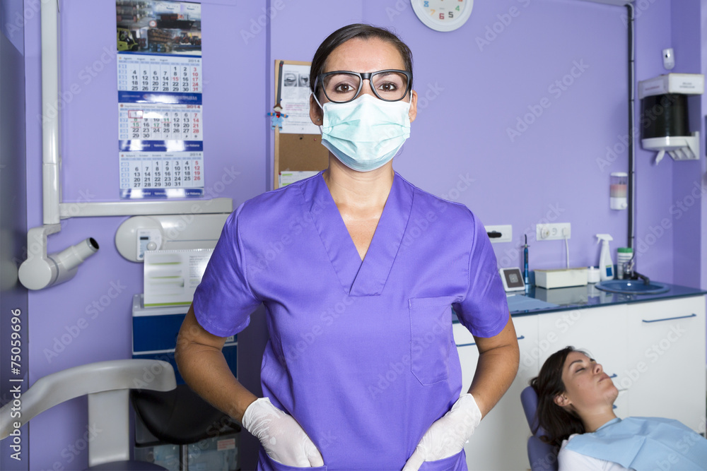 dental assistant with a mask dental assistant with a mask
