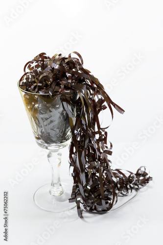 Crystall glass filled with audio tape