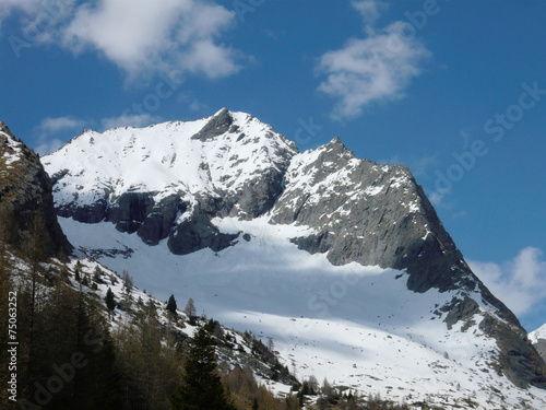 Alpine Thaw. Snowy Mountain on Spring