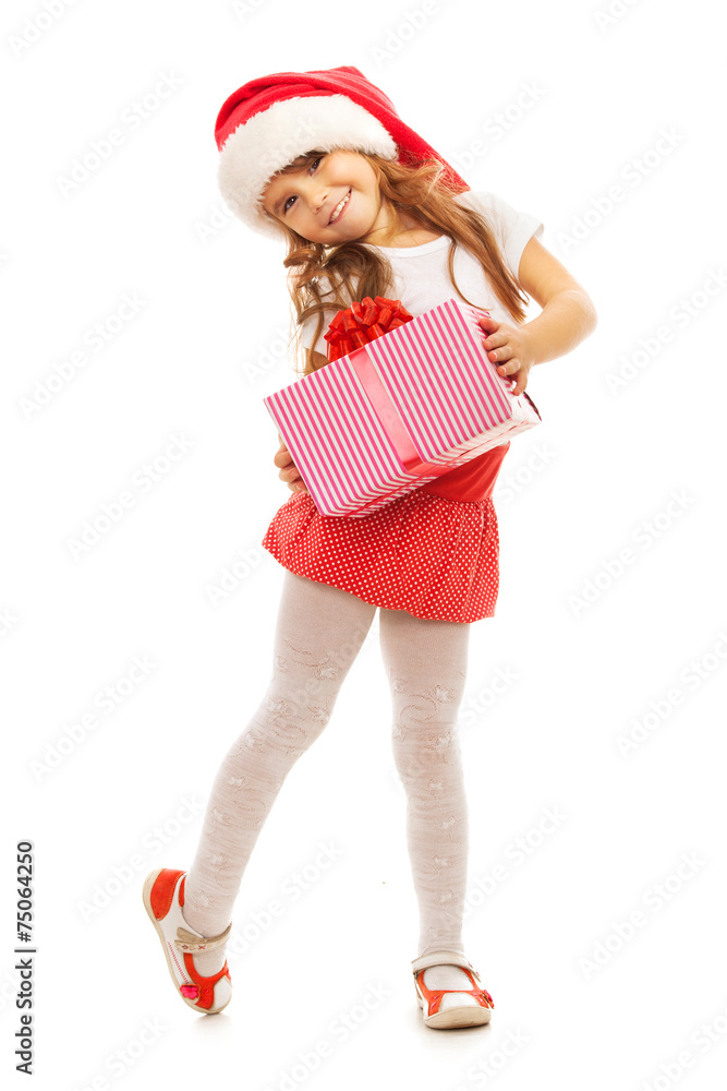 Child holding Christmas gift box in hand. Isolated on background Child holding Christmas gift box in hand. Isolated on background
