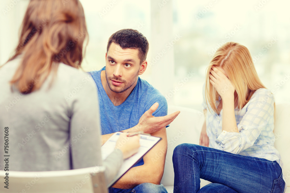 young couple with a problem at psychologist office young couple with a problem at psychologist office