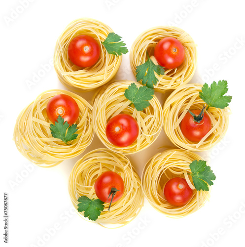 Raw italian pasta with cherry tomatoes