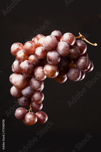 grape bunch on black