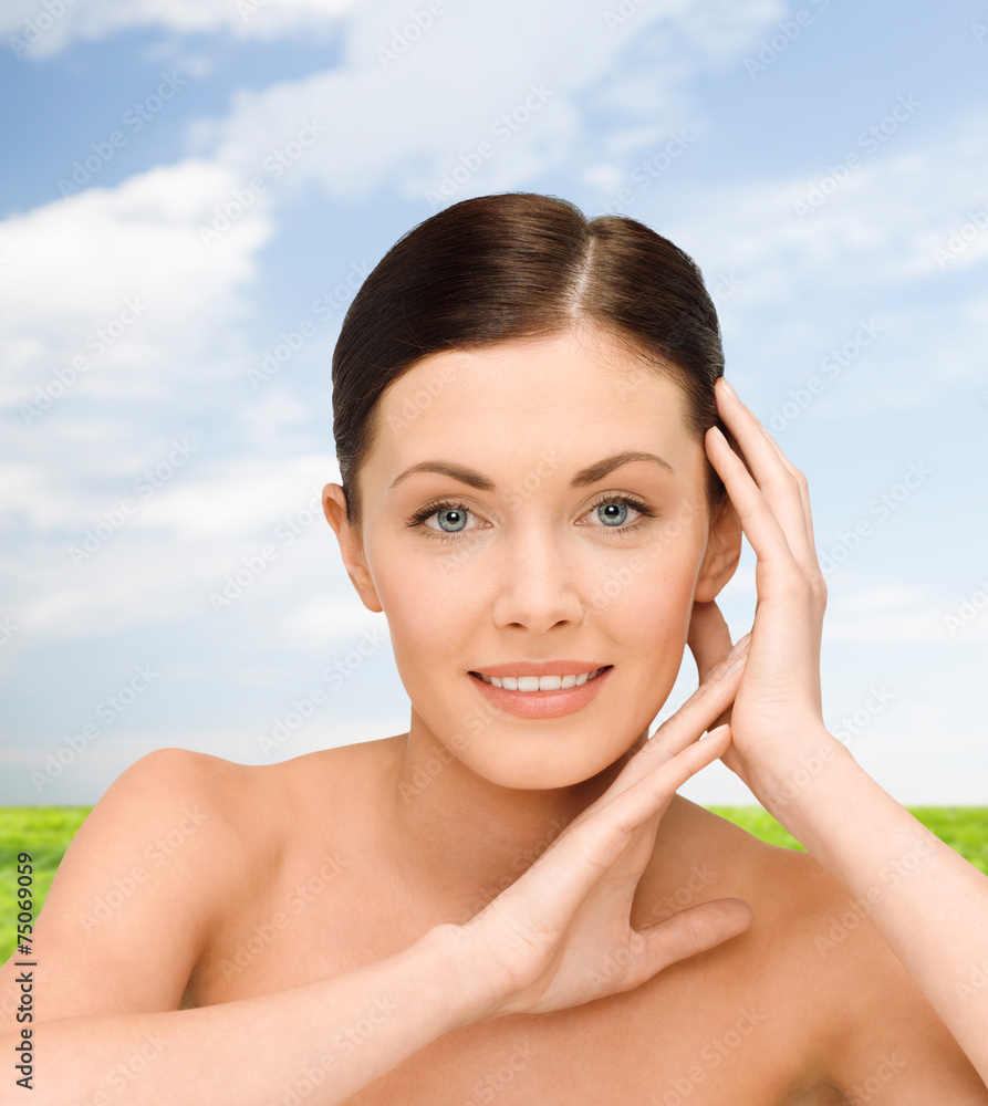 smiling young woman with bare shoulders smiling young woman with bare shoulders