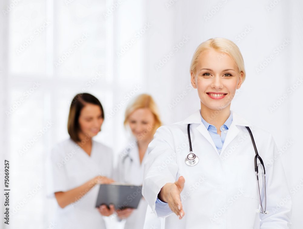 smiling female doctor with stethoscope smiling female doctor with stethoscope