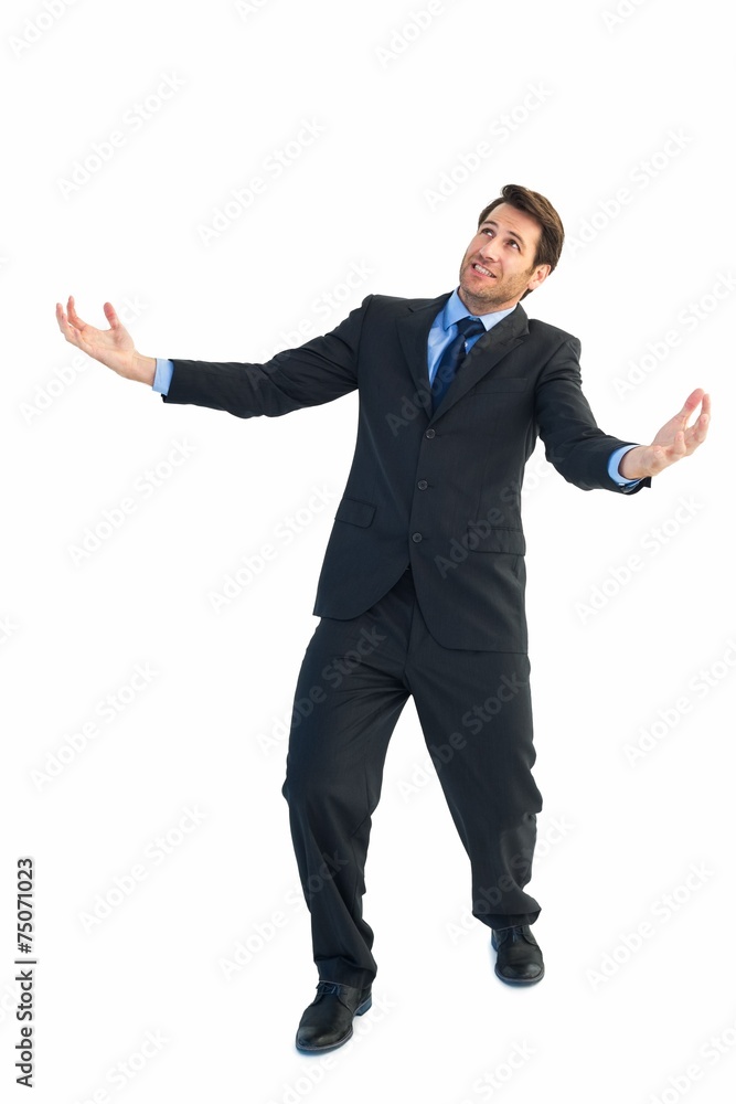 Businessman carrying something heavy with his hands Businessman carrying something heavy with his hands