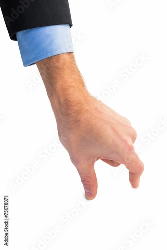 Businessman measuring something with these fingers