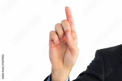 Businessman hand pointing something up