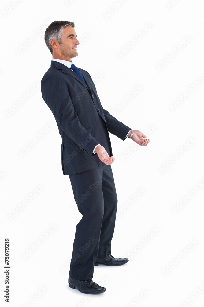 Cheerful businessman posing with arms out Cheerful businessman posing with arms out