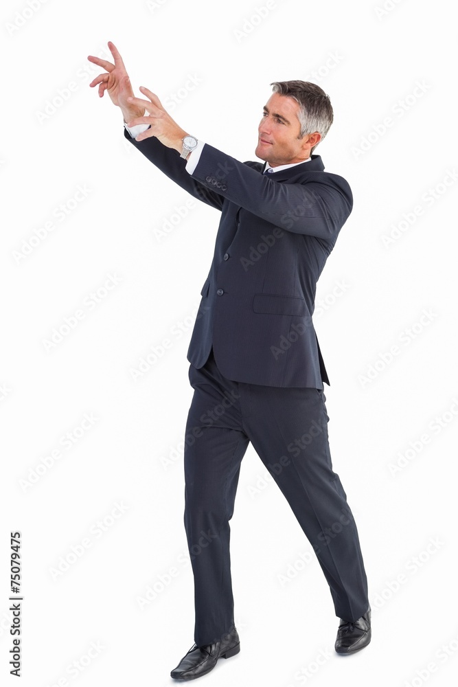 Happy businessman standing with arms up Happy businessman standing with arms up