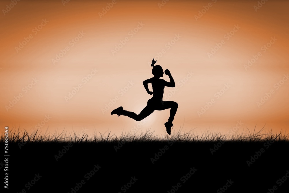 Composite image of fit brunette running and jumping Composite image of fit brunette running and jumping