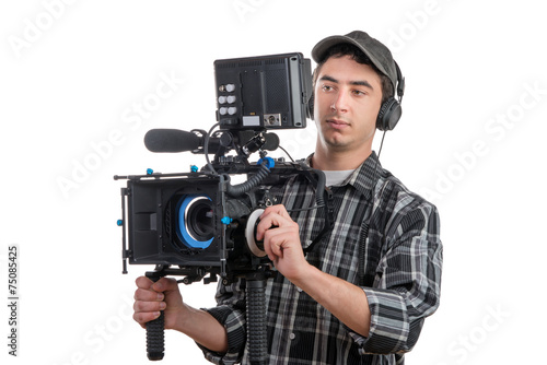 young cameraman and professional camera