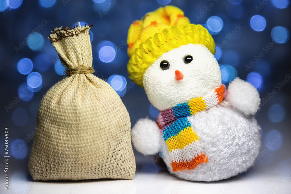 Obraz premium Christmas snowman toy and sack
