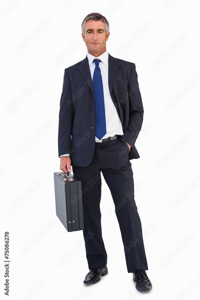 Smiling businessman holding black briefcase Smiling businessman holding black briefcase