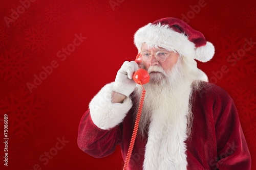 Bilde på lerret Composite image of santa on his red phone