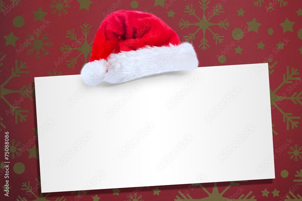 Composite image of santa hat on poster Composite image of santa hat on poster
