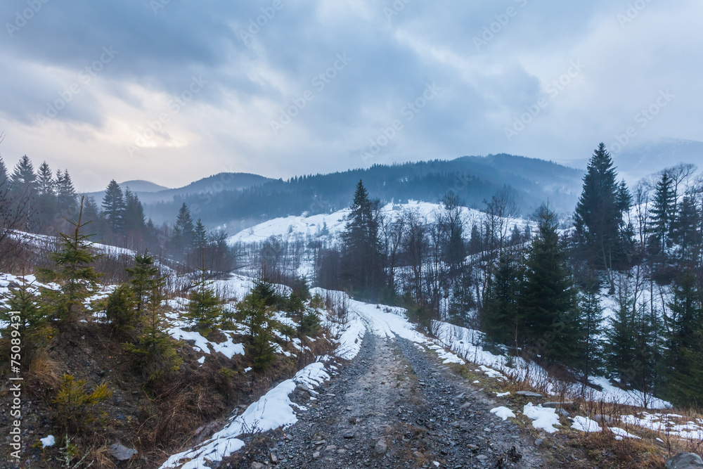 Fantastic winter landscape. Dramatic overcast sky. Fantastic winter landscape. Dramatic overcast sky.