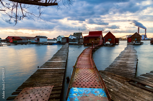 Sunset lake Bokod with pier photo