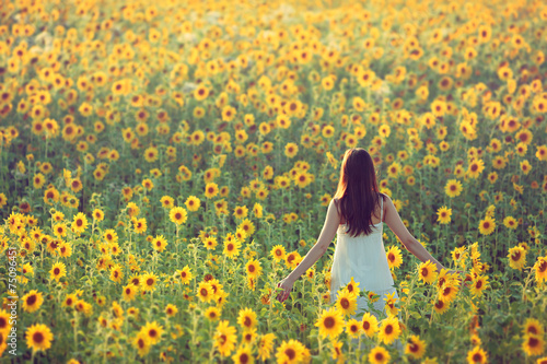 Girl in sunflowers