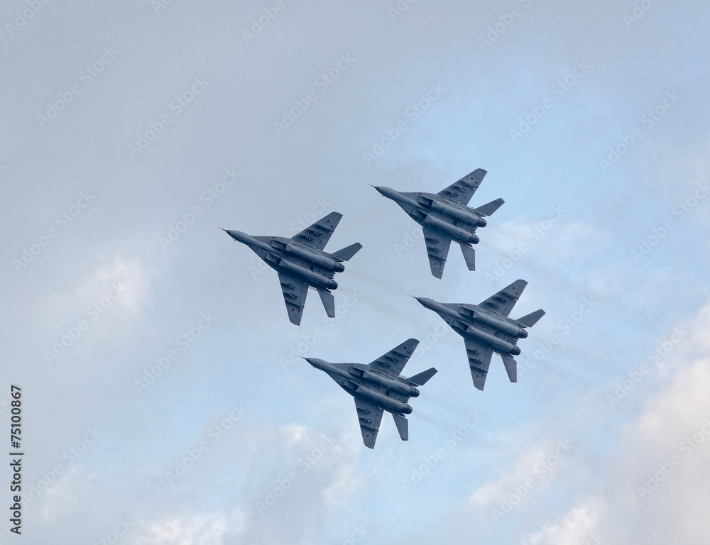 Military jet planes showing aerobatics Military jet planes showing aerobatics